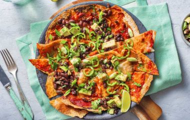 Mouthwatering Recipe - Mexican Pizza with Chorizo and Avocado - A Perfect Combination of Spicy Sausage, Creamy Avocado, and Crispy Tortilla for a Flavorful Fiesta! 